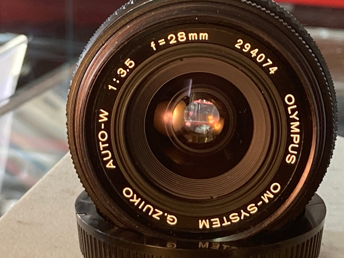 Olympus G.Zuiko Auto-W 28mm f/3.5 – frontglas