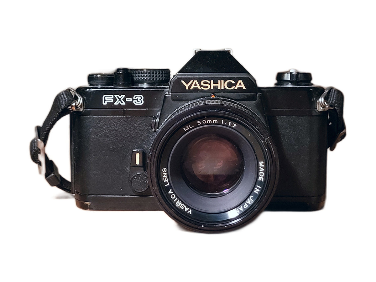 Yashica FX-3 + Yashica ML 50mm f/1.7 35mm Spiegelreflexcamera – vintage analoge camera bij De Majum Rotterdam