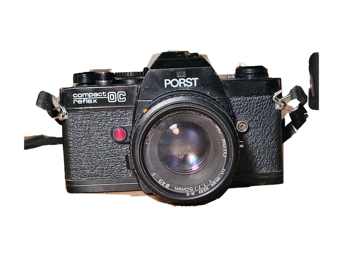 Porst Compact Reflex OC 35mm SLR camera met Porst Color Reflex MC Auto 50mm f/1.7 lens – vintage analoge camera bij De Majum Rotterdam