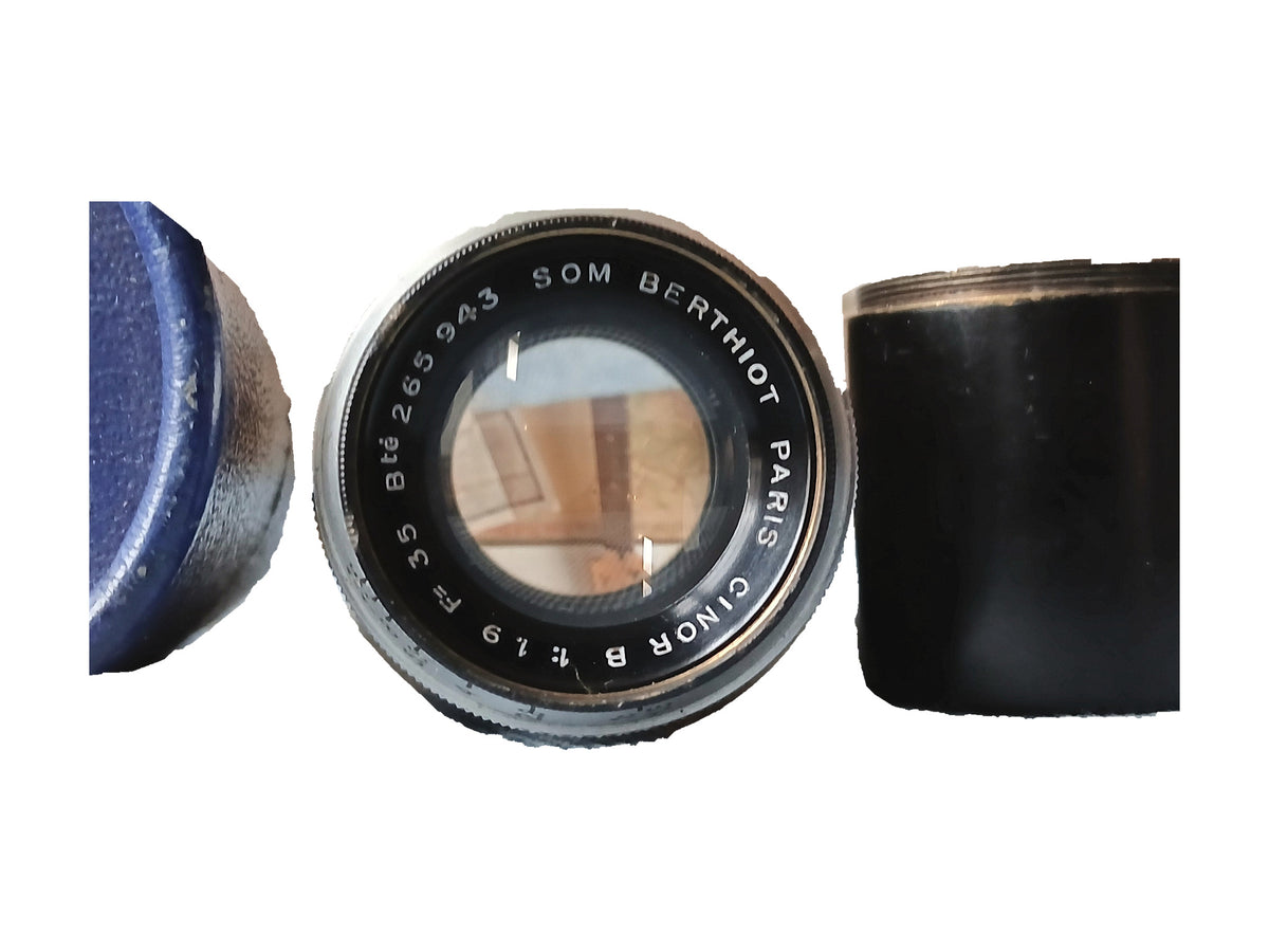 SOM Berthiot Cinor B 35mm f/1.9 met originele blauwe koker en zonnekap – foto 1 van 4