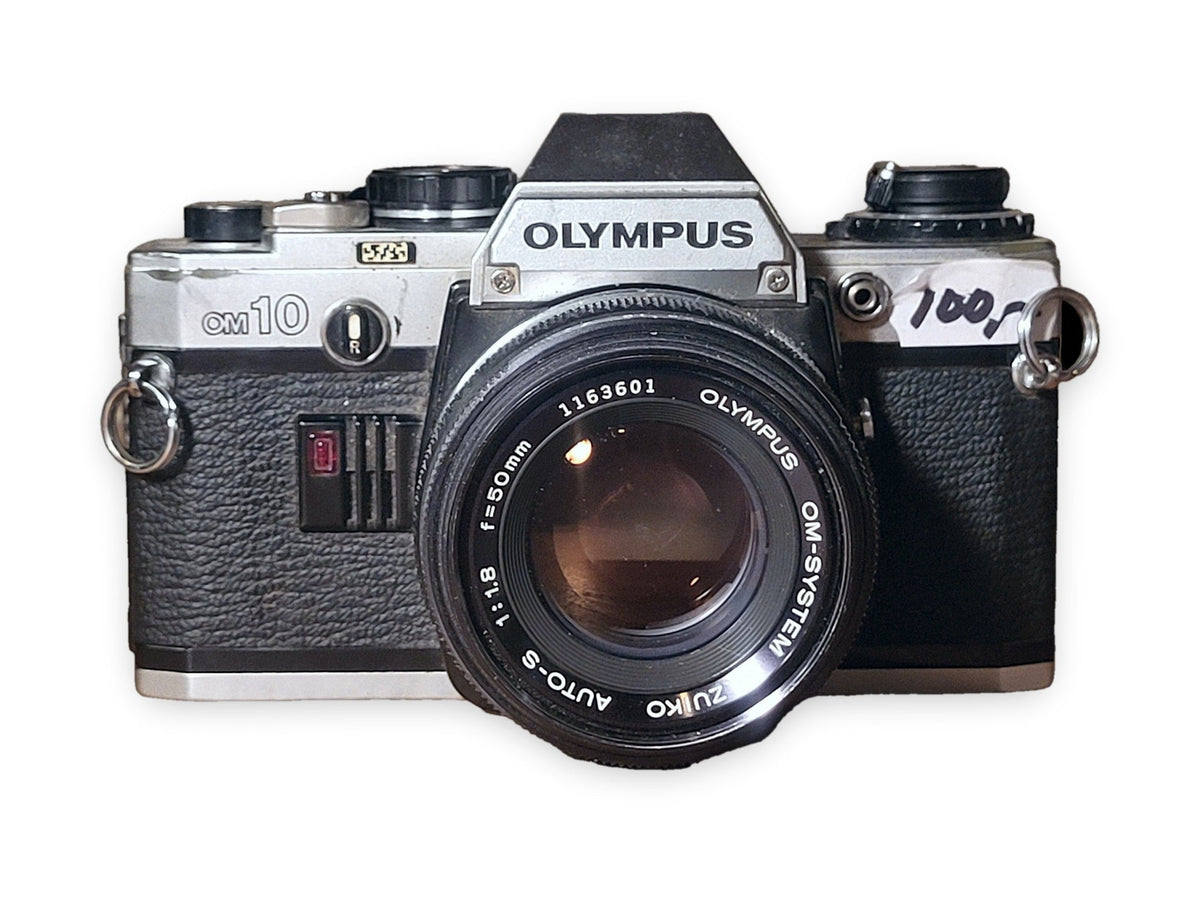 Olympus OM-10 analoge 35mm spiegelreflexcamera met Zuiko 50mm f/1.8 – vintage analoge camera bij De Majum Rotterdam