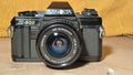 Minolta X-300 35mm Spiegelreflexcamera + MD W.Rokkor 28mm f/3.5 – foto 1