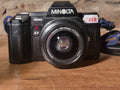 Minolta 7000 AF 35mm analoge spiegelreflexcamera met Minolta AF Zoom 35-70mm f/4 – vintage analoge camera bij De Majum Rotterdam
