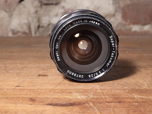 Asahi Pentax Super-Takumar 28mm f/3.5 – M42 groothoeklens – vintage analoge camera bij De Majum Rotterdam