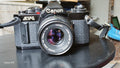 Canon AV-1 analoge spiegelreflexcamera met FD 50mm f/1.8 – foto 1