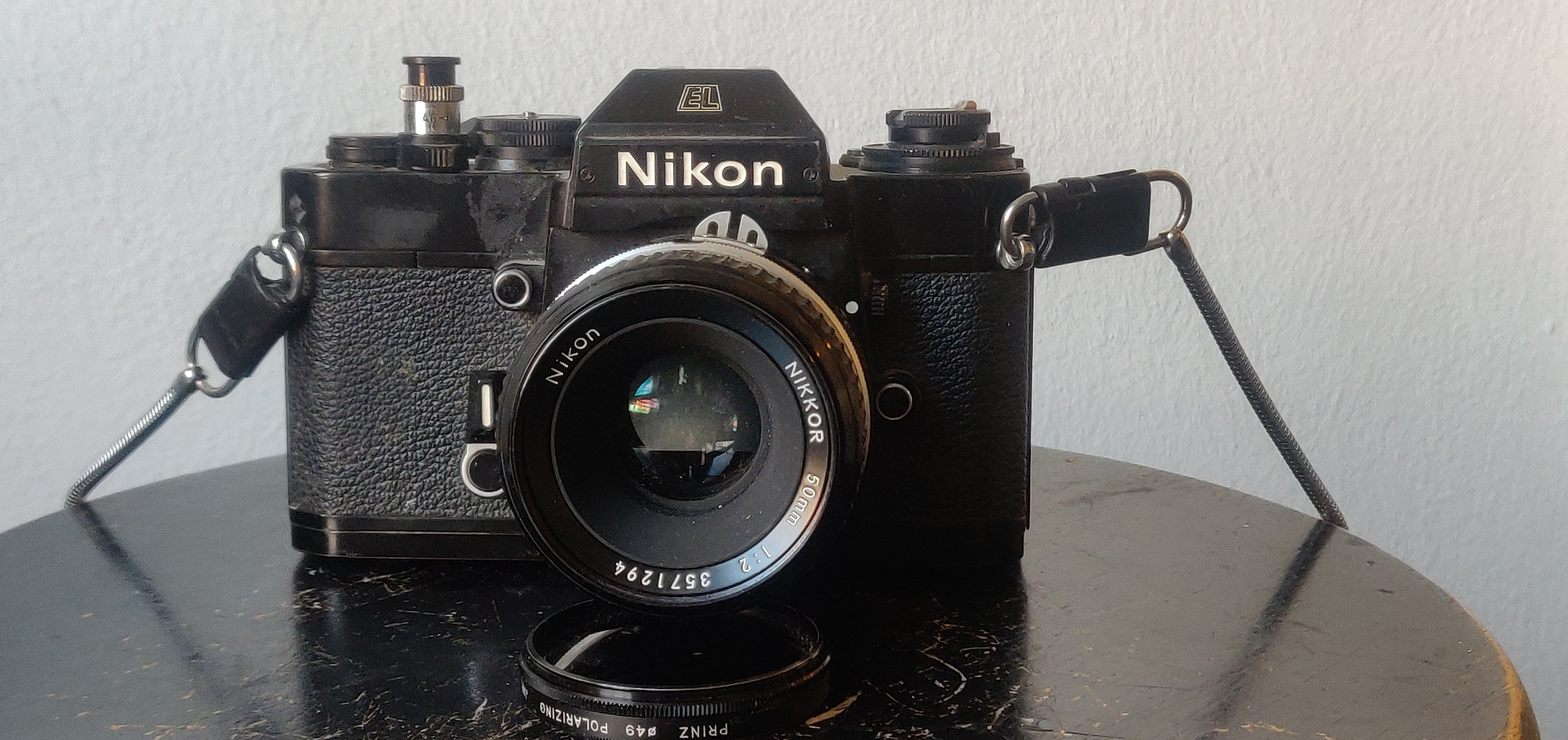 Nikon EL Zwart 35mm SLR Camera met Nikkor 2/50mm Lens – vintage analoge camera bij De Majum Rotterdam