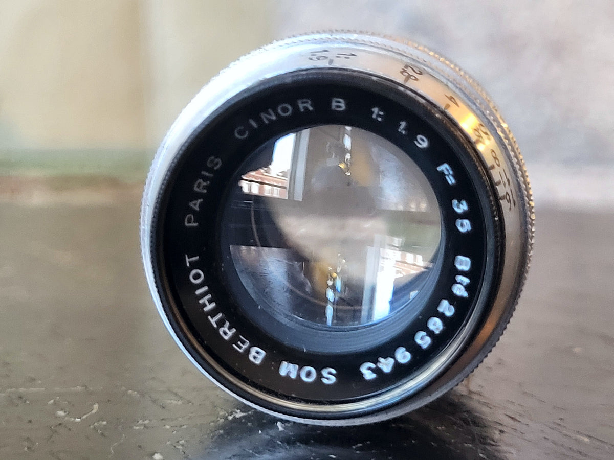 Som Berthiot Paris Cinor B 25mm f/1.9 cinelens met zwarte zonnekap – foto 1 van 4