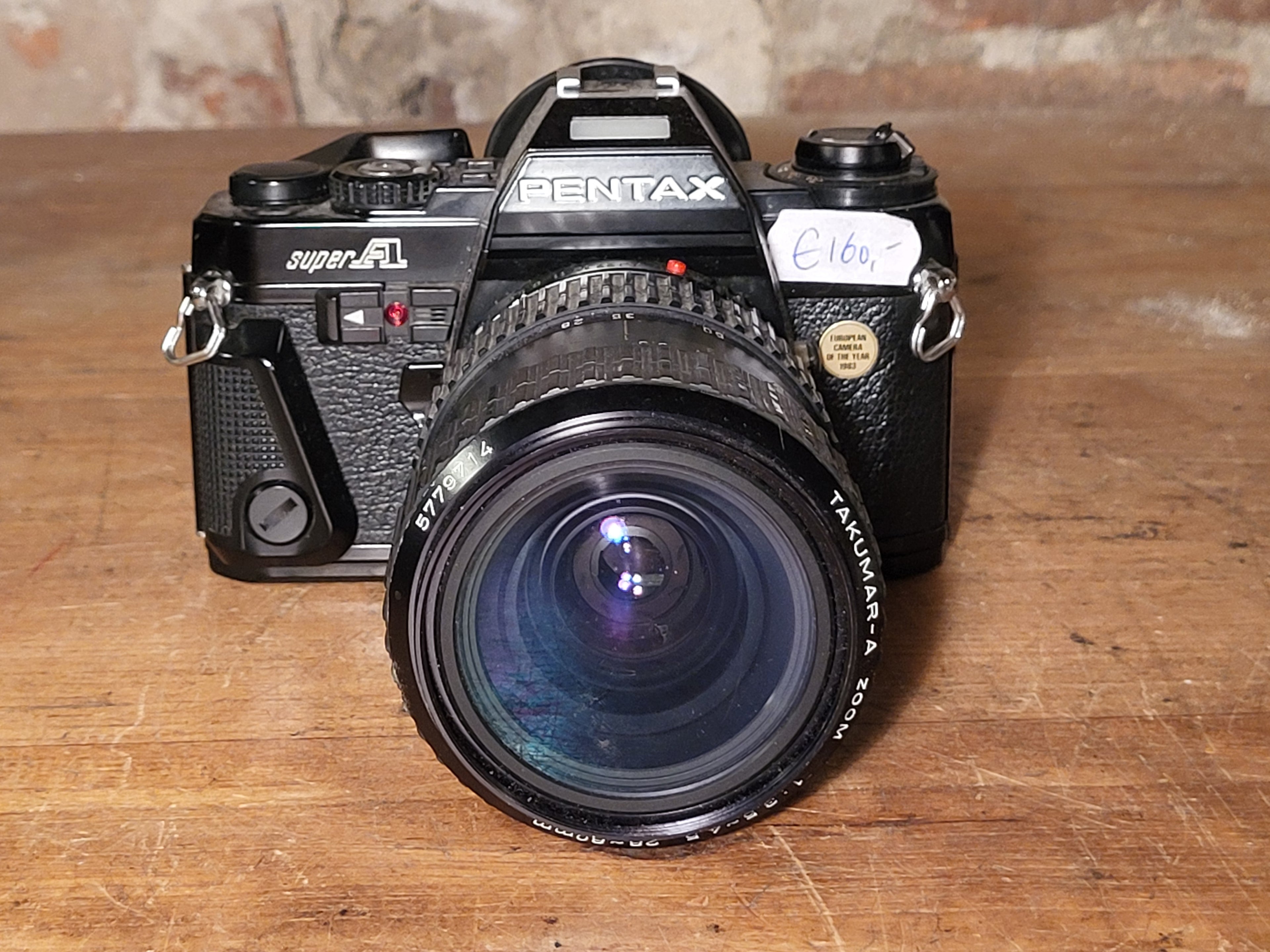 Pentax Super A 35mm spiegelreflexcamera met Takumar-A Zoom 28-80mm f/3.5-4.5 – vintage analoge camera bij De Majum Rotterdam