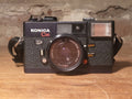 Konica C35 EF – vintage analoge camera bij De Majum Rotterdam