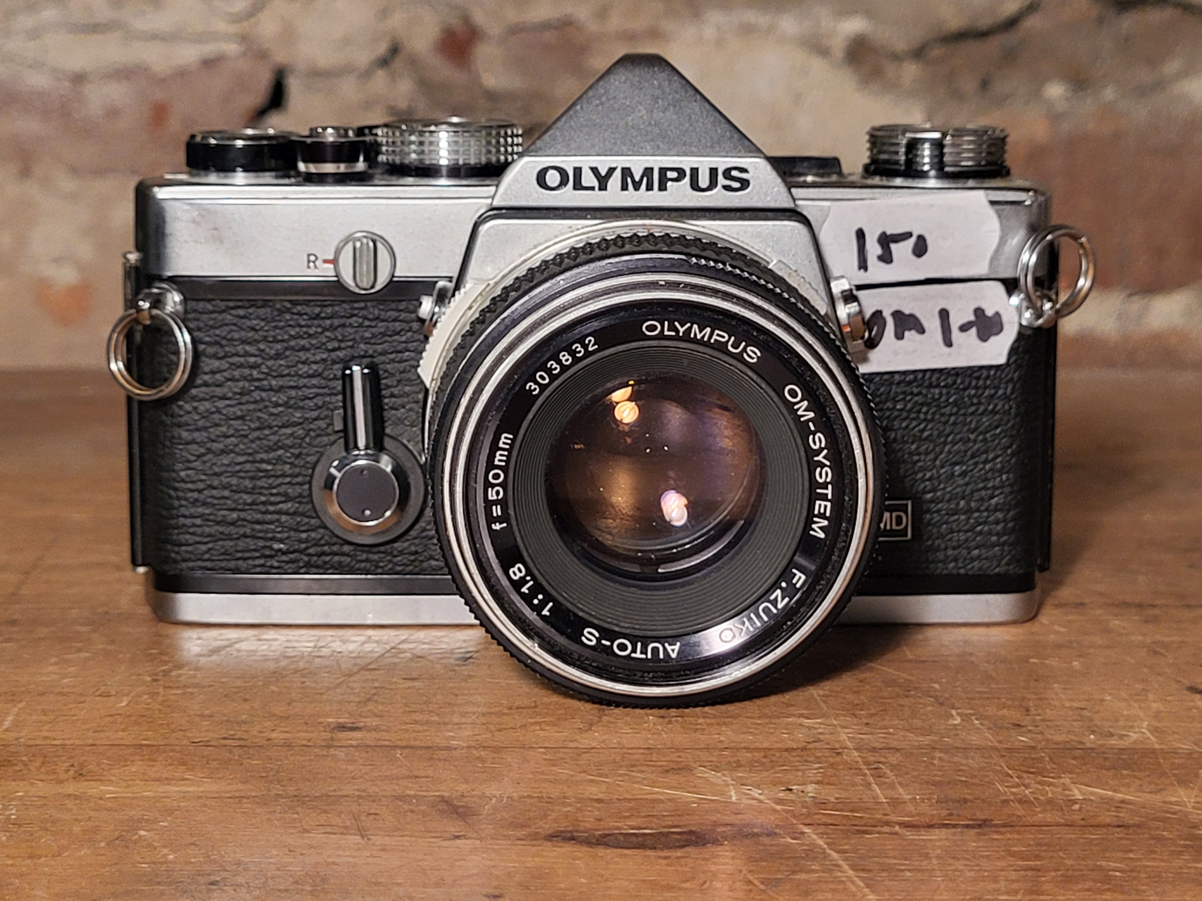 Olympus OM-1 MD met Olympus OM-System F.Zuiko Auto-S 50mm f/1.8 – vintage analoge camera bij De Majum Rotterdam