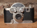 Universal Mercury II Half Frame Camera met Universal Tricor 2.7/35mm lens – vintage analoge camera bij De Majum Rotterdam