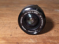 Minolta MC W. Rokkor-SI 24mm f/2.8 Groothoeklens voor Minolta SR/MD – vintage analoge camera bij De Majum Rotterdam